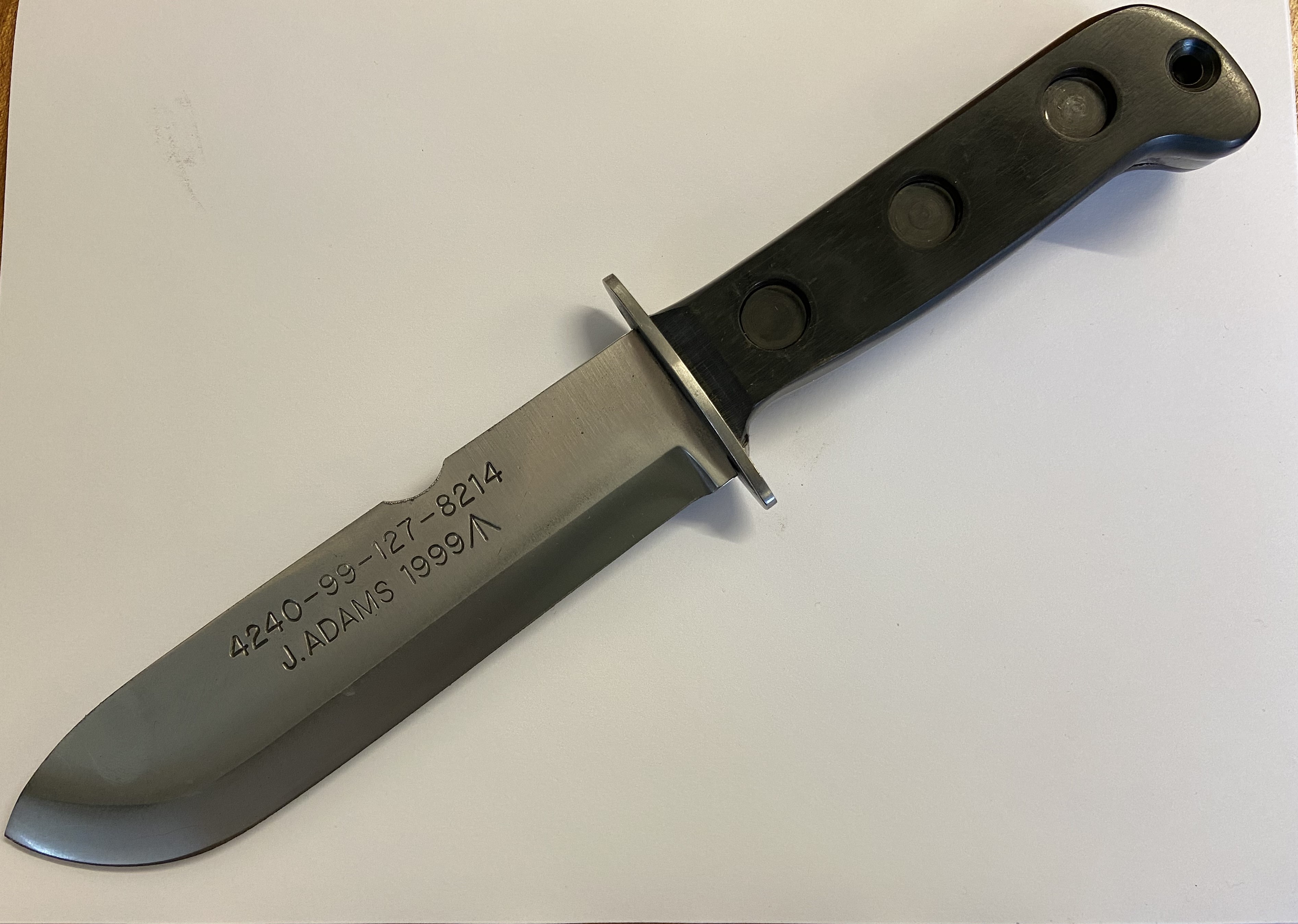 SURVIVAL KNIFE, BLACK FIBRE HANDLE, BRIGHT BLADE WITH STRIKING NOTCH